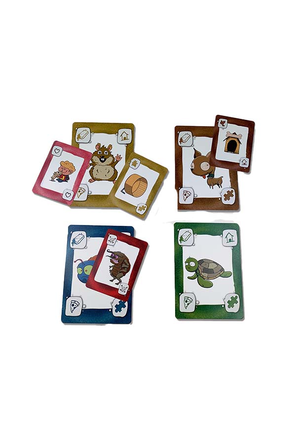 Muestra diversas cartas del juego "Mascotas", cada una representando animales como hámsteres, tortugas y peces, junto con sus necesidades (comida, juguetes, etc.). Un juego educativo que combina diversión y estrategias para enseñar el cuidado de mascotas.