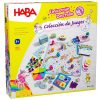 La portada de Unicornio Destello: Colección de Juegos de HABA muestra una selección de los componentes del juego. Con ilustraciones de arcoíris, gemas brillantes y simpáticos unicornios, esta caja refleja el mundo mágico y divertido que propone el juego.