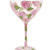 Delicada copa de cóctel de la marca Lolita decorada con un patrón de rosas en tonos rosados y verdes. Perfecta para brindar en ocasiones especiales o como regalo romántico.