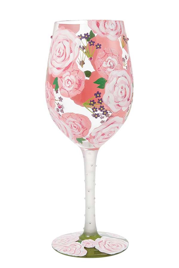 Elegante copa de vino con un diseño floral pintado a mano que combina delicados tonos rosas y verdes. Ideal para una velada especial o para regalar.