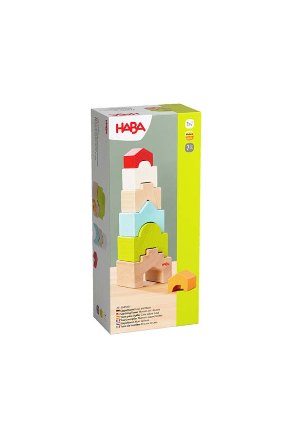 Empaque frontal del encantador juego "Torre de Casa" de HABA. Incluye 7 piezas de madera de colores y formas únicas para apilar y crear estructuras. Diseñado para niños pequeños, combina aprendizaje y diversión.