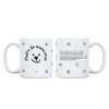 Taza de cerámica blanca con diseño de caritas de perros y la frase 