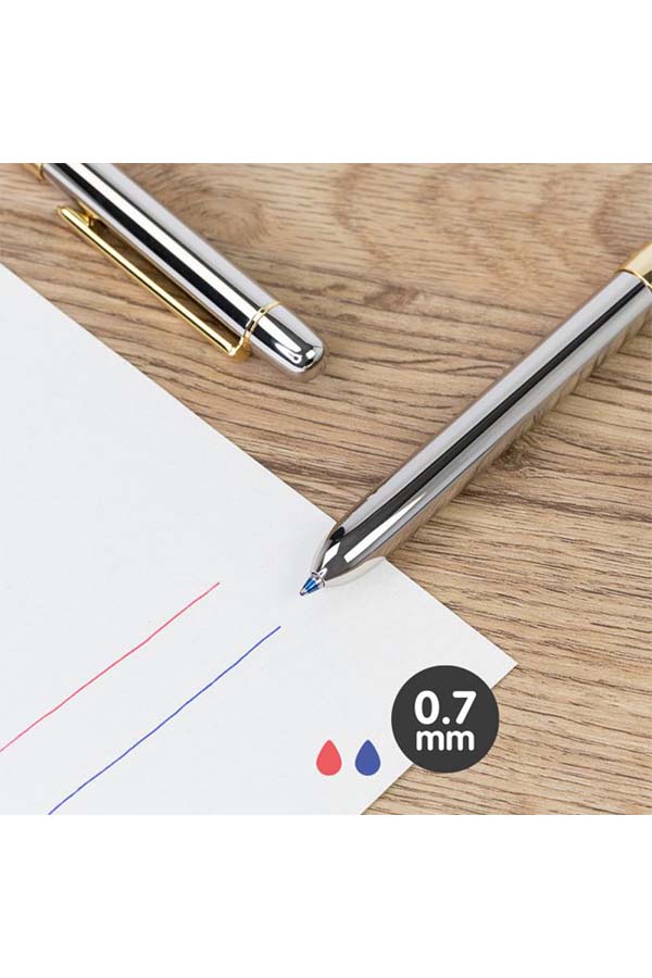 Primer plano del portaminas Milan usando los bolígrafos de tinta azul y roja con punta de 0,7 mm, ofreciendo escritura fluida y colores vibrantes.